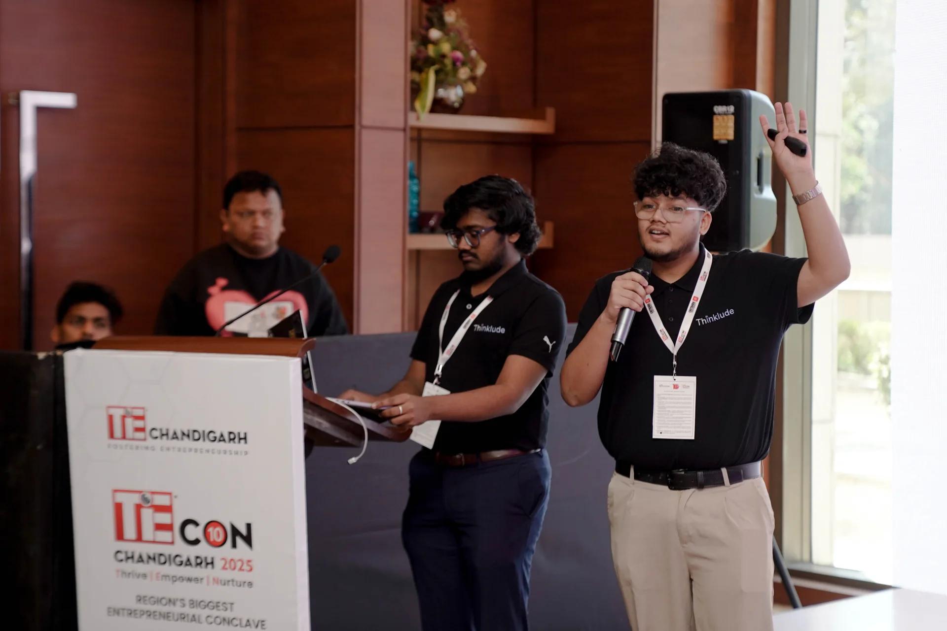 A Thinklude team member presenting on stage at TiEcon Chandigarh
